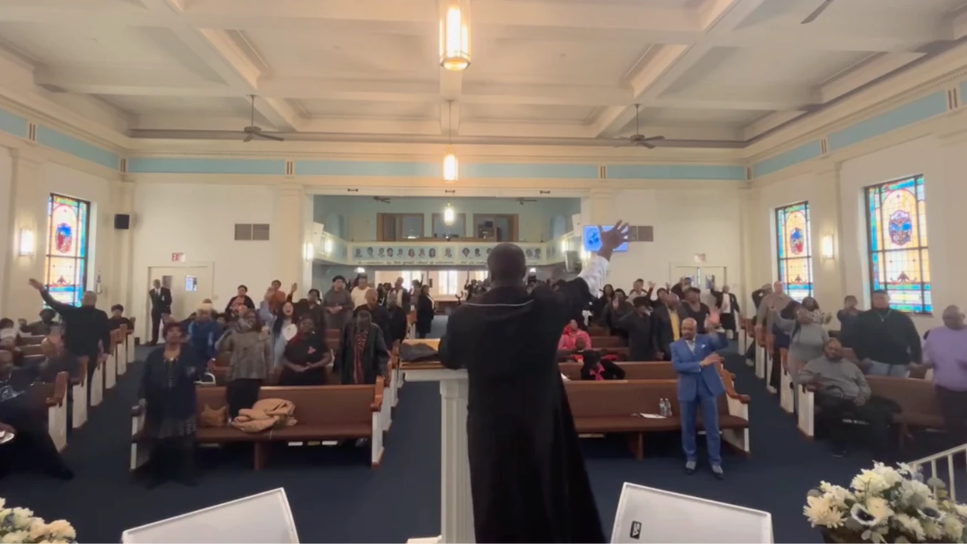 Second Baptist Church worshiping together in the Erie sanctuary